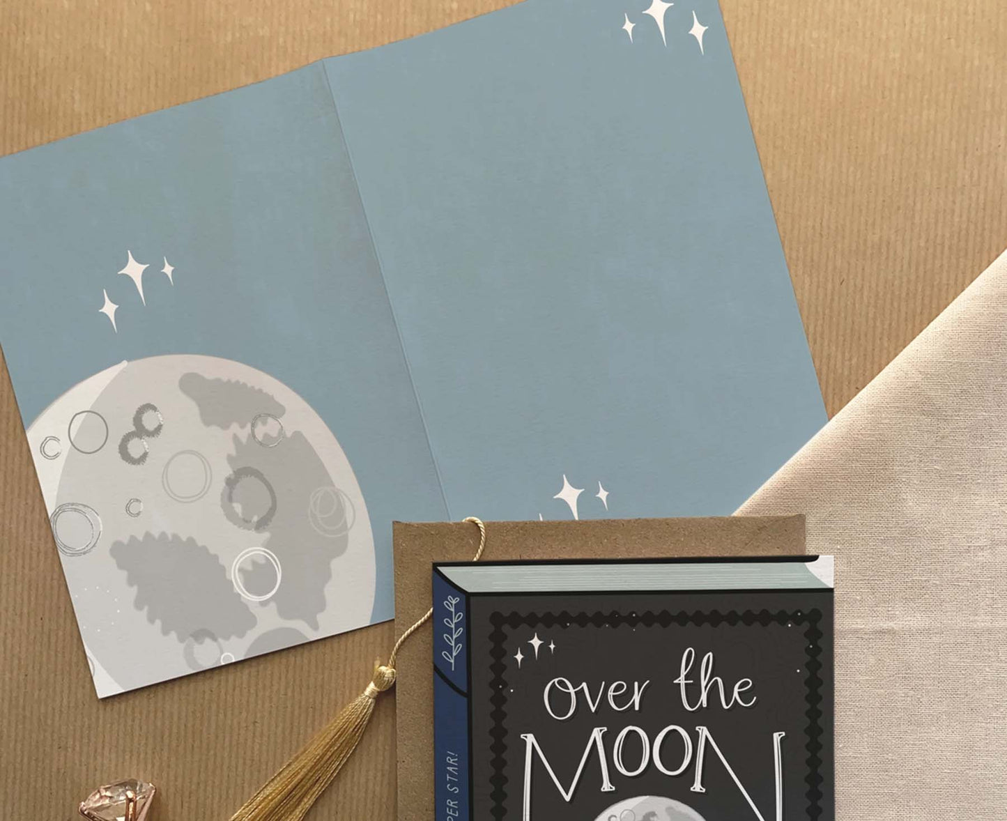 Over The Moon Book Congratulations Card