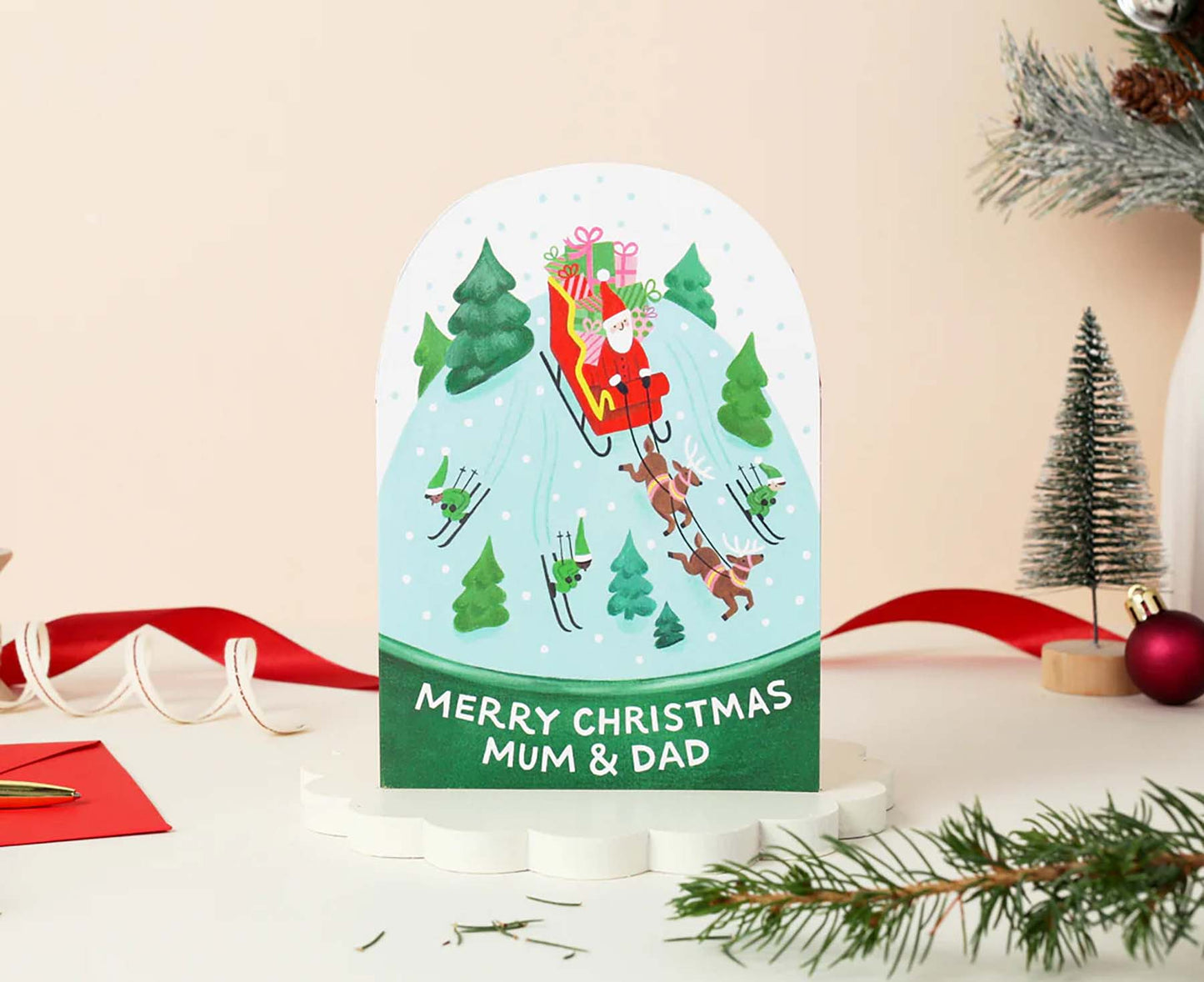 Merry Christmas Mum & Dad Sledging Santa Christmas card